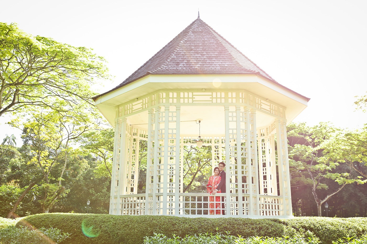 White garden gazebo decorated for outdoor wedding ceremony in Singapore park
