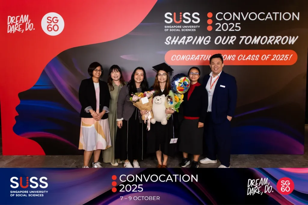 Guests enjoying the iSnap photo booth at a Singapore corporate event