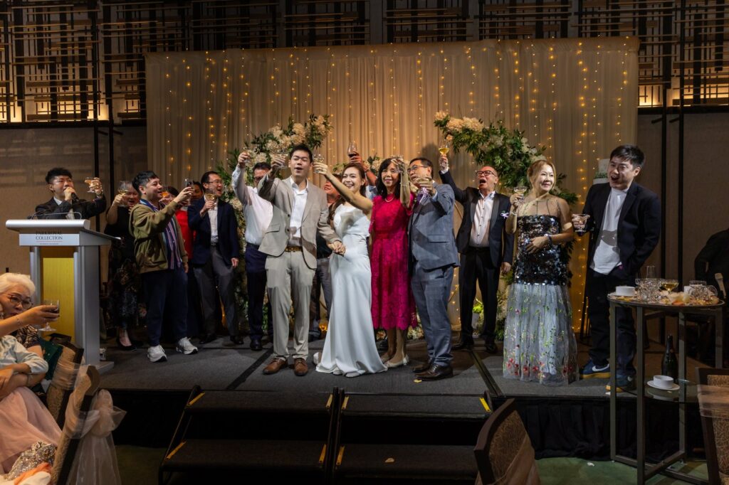 Wedding videography vs photography Singapore — banquet march-in