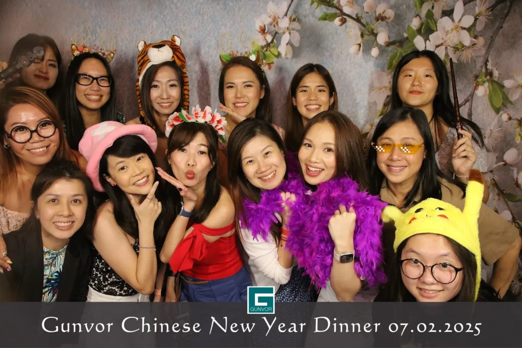 Guests having fun at an iSnap instant photo booth in Singapore